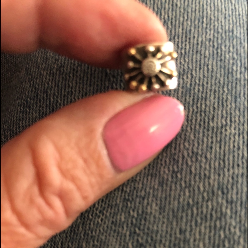 Desert Star Pandora Charm which is retired. Beautiful condition. SS and 14K gold
